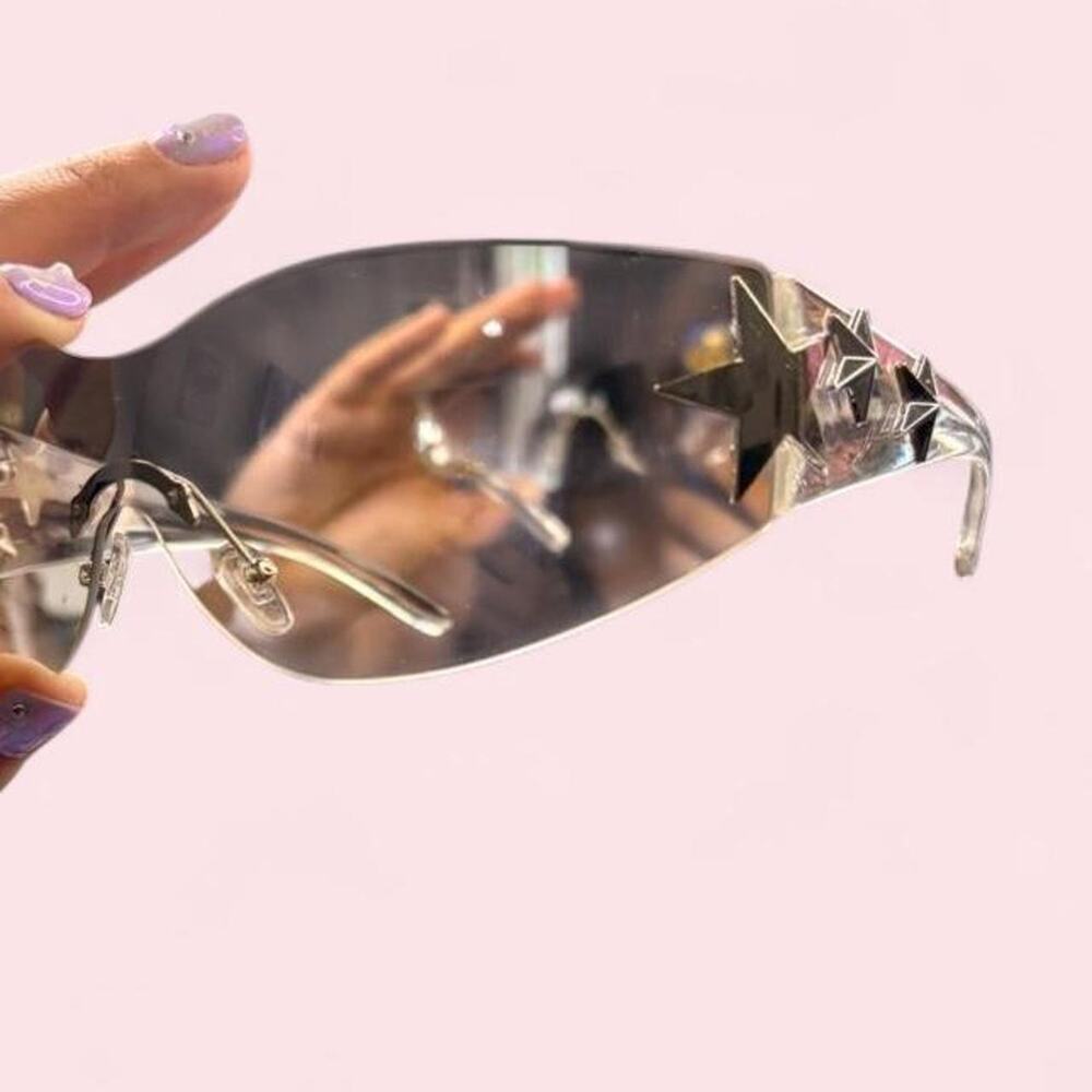 White clear sunglasses with silver stars cyber futuristic scene